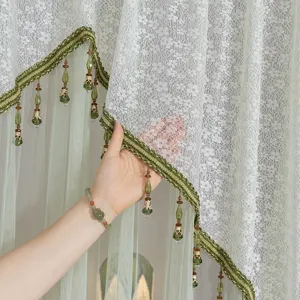 Elegant white lace door curtain with green tassel trim, breathable mosquito net for room.