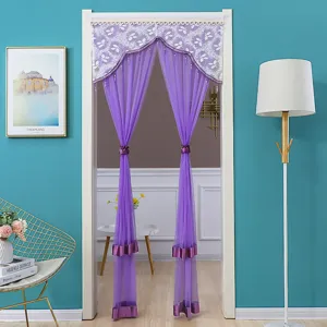 Purple sheer door curtain detail, lace trim and beaded decor, elegant bedroom partition.