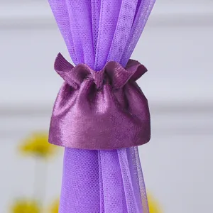 Purple curtain tieback with sheer mesh fabric, elegant home decor accessory for bedroom windows.