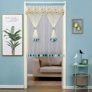 Double-layer sheer door curtain with lace embroidery and elegant blue velvet trim for home decor.