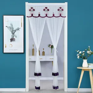 White sheer door curtain with purple floral embroidery and tassel hem for home decor.