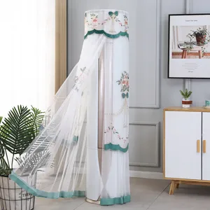 Vertical cylindrical air conditioner dust cover with floral embroidery and green trim.
