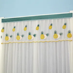 Short sheer mesh window curtain with embroidered pineapple pattern and green velvet top valance.