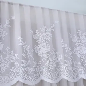 White lace dust cover for refrigerator and washing machine, elegant floral pattern sheer fabric.