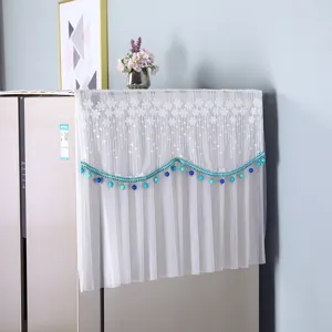 White lace refrigerator dust cover with beaded fringe, elegant fridge top protector cloth.