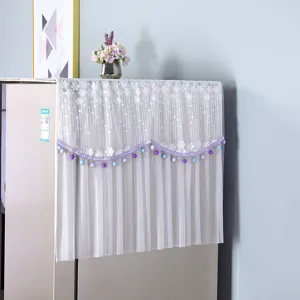 White lace refrigerator dust cover with purple beaded fringe, elegant top cover for home appliances.