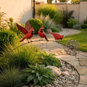 Decorative set of three red cardinal metal garden stakes with dandelion stem ornament