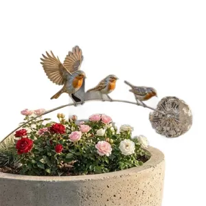 Artistic metal robin garden stakes featuring three birds on a branch with floral accents.