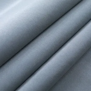 Hochwertiger hellgrauer Stoffdetail für Staubschutzabdeckung, glattes und langlebiges Textil.