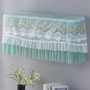 Elegant lace air conditioner dust cover in light green with delicate floral embroidery.