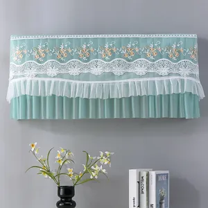 Elegant green lace air conditioner dust cover with floral embroidery for home wall units.