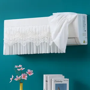 Dettaglio della copertura antipolvere in pizzo per condizionatore, elegante tessuto ricamato.