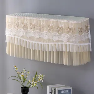 Lace air conditioner cover detail showing delicate floral embroidery and sheer mesh fabric.
