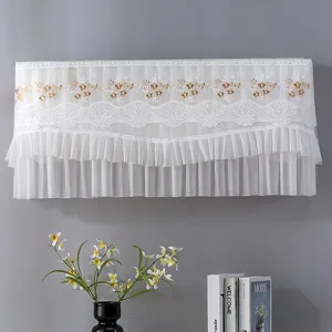White lace air conditioner dust cover with golden floral embroidery and pleats detail