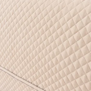 Close-up detail of thickened quilted bed headboard cover texture, soft and delicate.