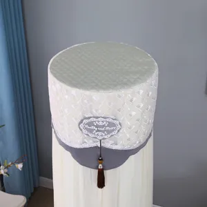Vertical cylindrical air conditioner cover dustproof fabric protector with tassel decor.