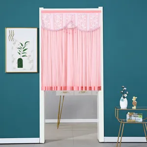 Pink double-layer lace door curtain detail, featuring delicate floral patterns and hanging tassels.