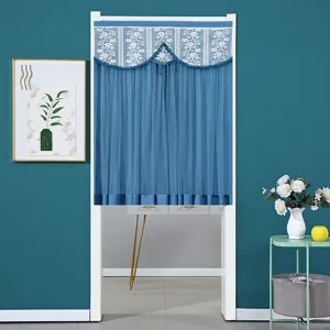Blue double-layer lace door curtain detail, featuring delicate floral patterns and tassels.