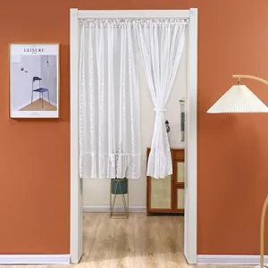 White lace door curtain sheer fabric half curtain detail view with elegant floral pattern.