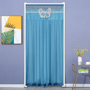 Blue mesh door curtain with delicate lace trim and large embroidered butterfly for home decor.