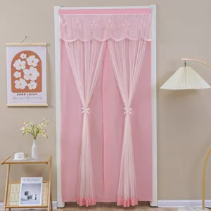 Detailed view of the pink lace door curtain, featuring elegant sheer mesh and cute bows.