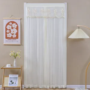 White lace door curtain detail, sheer sheer fabric, delicate embroidery, room partition.