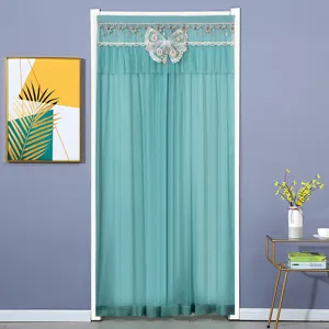 Detailed view of the elegant cyan mesh door curtain featuring delicate lace trim and butterfly.
