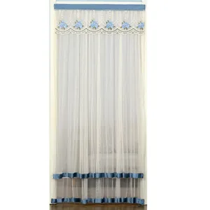 Beautiful double-layer lace door curtain with blue floral embroidery and stylish trim.