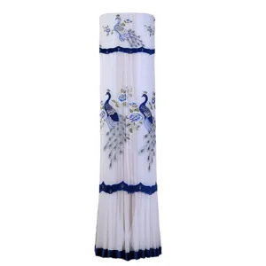 Standing cylindrical air conditioner dust cover with elegant peacock embroidery design.