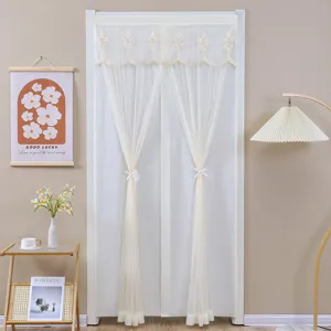 White lace mesh door curtain with delicate embroidery and tiebacks for elegant home privacy.