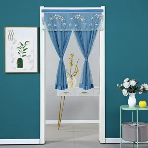 Blue double-layer lace door curtain detail, featuring elegant floral embroidery and mesh design.