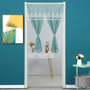 Elegant sheer lace door curtain with hanging tassels, perfect for bedroom and kitchen decor.