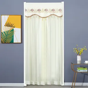 Detailed close-up view of the double layer doorway curtain featuring embroidered floral valance.