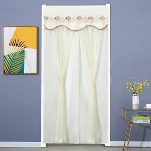 Detailed view of the double-layer lace embroidered door curtain, elegant sheer partition for bedroom.