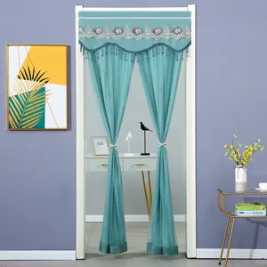 Turquoise double-layer door curtain detail, featuring lace embroidery and beaded fringe design.