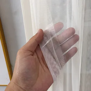 White sheer mesh curtain detail view, lightweight and breathable fabric for room decor.