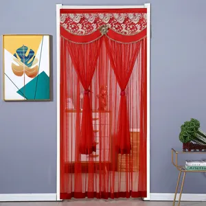 Detail view of elegant red mesh door curtain with delicate lace valance for home decor.
