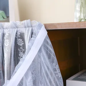 Blue lace dust-proof curtain detail view, showing fabric texture and fastener set.