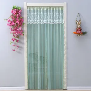 Green lace door curtain detail scene, elegant floral embroidery for home room partition.