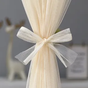 Beige sheer door curtain with mesh bow tie, elegant lightweight lace hanging curtain for room decor.