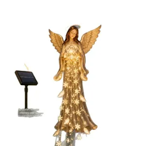 Solar angel garden stake light with glowing snowflake string lights for outdoor lawn decor