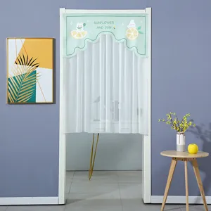 Detail view of the cute cartoon door curtain with sheer white lace bottom fabric for room decor.