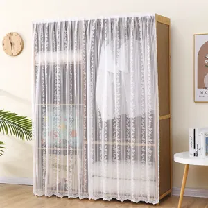 White lace dust curtain for wardrobe and bookshelf, elegant home decor fabric cover detail.
