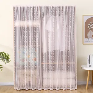 Pink lace dust curtain scene detail, cozy floral fabric cover for shelf and cabinet.