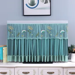 Copertura antipolvere per TV in pizzo verde con elegante ricamo floreale per schermi.