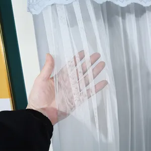 White sheer door curtain with blue lace top, premium mesh fabric, light filtering privacy.