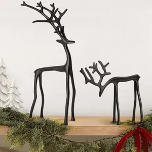 Set mit 2 eleganten schwarzen Rentierstatuen für moderne Weihnachtsdekoration zu Hause.