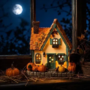 Detailliertes Miniatur-Kürbishaus-Licht am Fenster für die Halloween-Dekoration