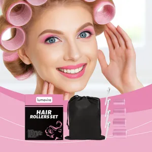 Detail shot of self-grip hair rollers set with metal clips and black storage bag.