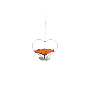 Hanging heart-shaped wrought iron bird feeder with vibrant orange flower tray for garden